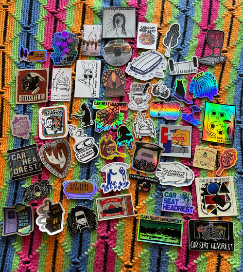 2 embossed stickers +/- misc stickers